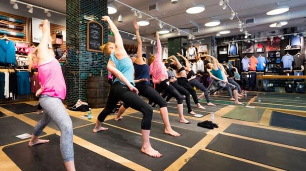 A Lululemon in-store workout class for its customers and advocates